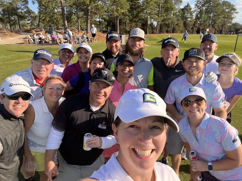 Griffin Golf community members gathered on the course after a round